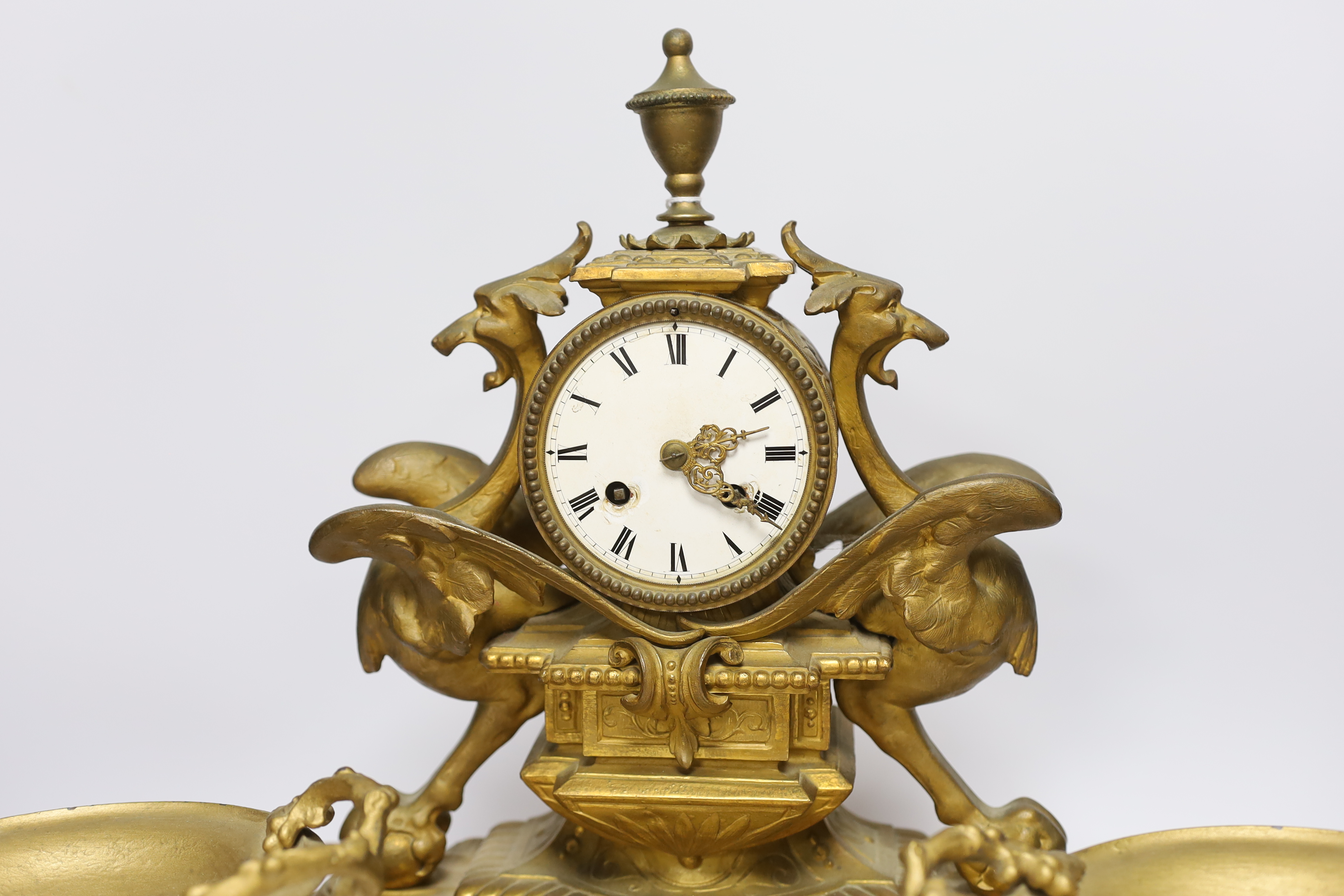 A Victorian gilt painted spelter mantel clock garniture, (dome missing) clock 43cm high